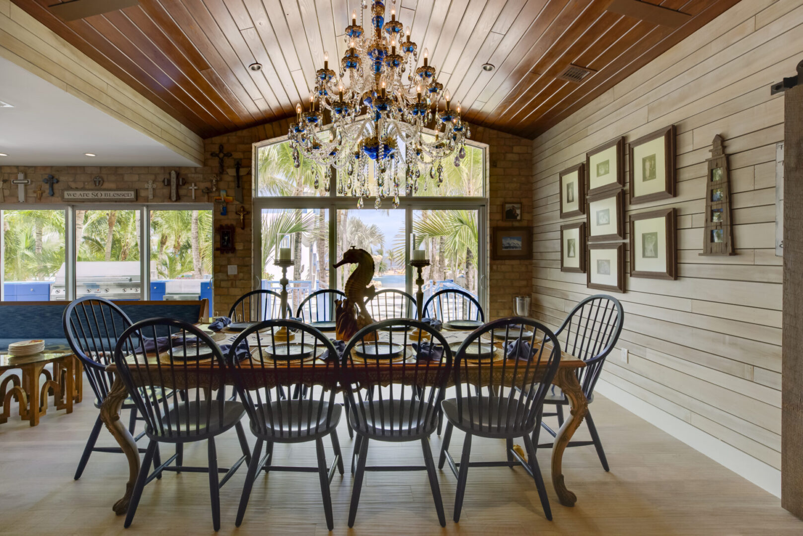 A large dining room table with chairs around it.